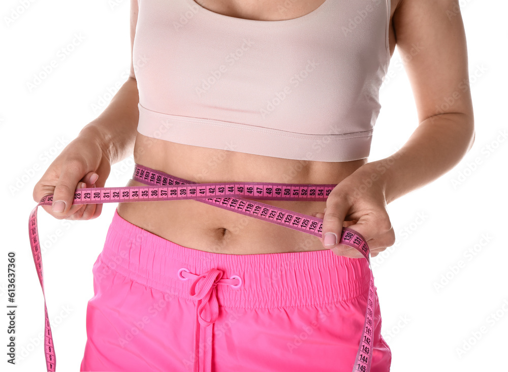 Young woman with measuring tape on white background. Diet concept