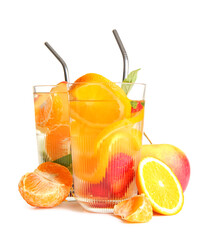 Glasses of infused water with different sliced fruits on white background