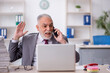 © Elnur - Old male employee and too much work in the office