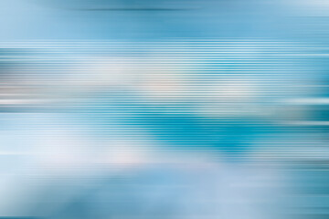 blue abstract motion blurred background. light pale blue surface
