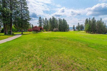 Canvas Print - Manicured fairways, greens and hazards at a suburban golf course, part of a luxury golf community of homes in the rural town of Post Falls, Idaho, in the general Coeur d'Alene area of North Idaho.
