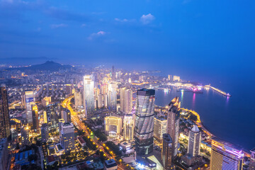 Wall Mural - Qingdao Urban Coastline CBD Night Scenery Aviation