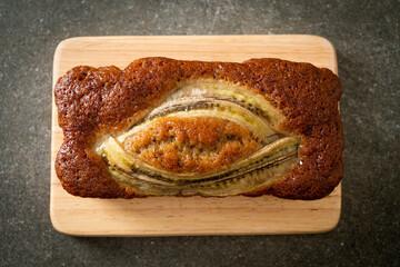 Wall Mural - banana cake on wood board