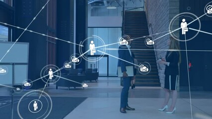 Poster - Animation of network of icons over diverse businessman and businesswoman discussing at office