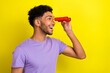 © deagreez - Side photo of young surprised man hold goggles sightseeing look curious novelty theatre concert isolated on yellow color background