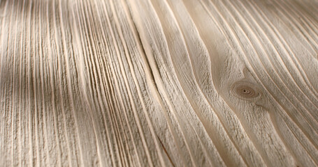 Brushed wood. The surface of aged wood with a metal brush. Close up. Angle view.