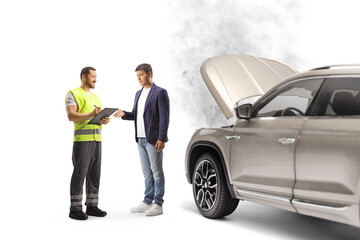 Wall Mural - Road assistance worker and a man discussing a car problem