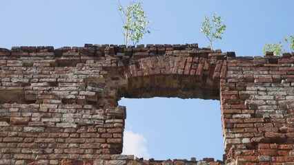 Poster - destroyed brick wall against the sky.