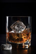 ice cubes in a glass glass with whiskey, close-up