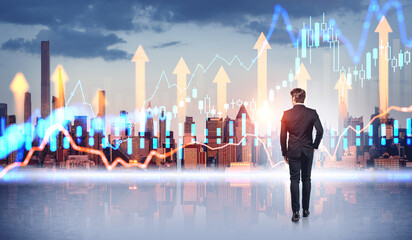 Wall Mural - Businessman in New York city looking at growing financial graphs