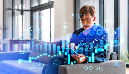 Poster - Man with tablet in office and financial diagram holograms