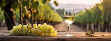 White Wine With Grapes On Old Wooden Table, Blurred Vineyard Background. Generative Ai