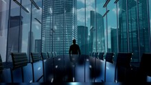 Loans. Businessman Working In Office Among Skyscrapers. Hologram Concept