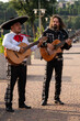 © scharfsinn86 - Mexican musician mariachi band on a city street.