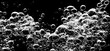 canvas print picture - Soda water bubbles splashing underwater against black background. Cola liquid texture that fizzing and floating up to surface like a explosion in under water for refreshing carbonate drink concept.