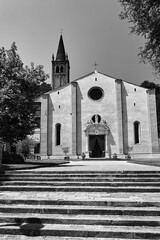 Canvas Print - stone steps and facade of the historic church of Parrocchia di Santa Maria Assunta in Monteortone