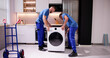 © Andrey Popov - Washing Machine Appliance Delivery And Install