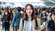 © wetzkaz - young adult woman or teenage girl, at a train station or airport, fictitious place, with a jacket, crowd busy