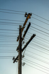 electricity post with blue sky background, power pole with electrical wires