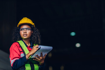 Workers Factory or Engineering work at factory site check up machine or products in site. Foreman or Technician checking Material or Machine on Plant. Heavy industry factory concept.