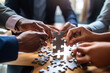 © Starmarpro - Diverse corporate office workers collaborate in a team building puzzles. Team work concept. Unity and synergy in business concept by merging jigsaw puzzle. High quality photo