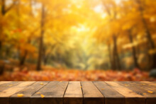 The Empty Rustic Wooden Table Against The Background Of An Autumn Forest