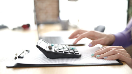 Sticker - Young blonde woman business worker using laptop and calculator at office