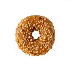 Poster - Donut with caramel filling with nuts on a white background. Isolate.Top view