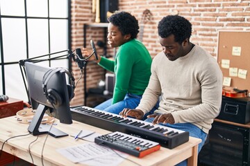 Poster - African american man and woman music group singing song playing keyboard piano at music studio