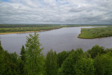 Wall Mural - summer landscape on the river with clouds.cloudy weather.