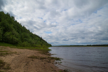 Wall Mural - summer landscape on the river with clouds.cloudy weather.