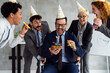 © Novak - Business team celebrating birthday to colleagues
