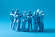 © ink drop - A group of paper people coming together. Community and friendship concept