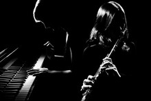 Musical Duet Piano And Flute Player. Pianist And Flutist Classical Musicians