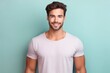 © Tuyres - Portrait of a muscular handsome guy wearing a plain t-shirt, isolated on a pastel background. Generative AI illustration.
