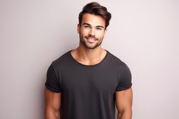 Wall Mural - Portrait of a muscular handsome guy wearing a plain t-shirt, isolated on a pastel background. Generative AI illustration.