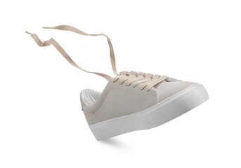 Sticker - One stylish beige sneaker isolated on white