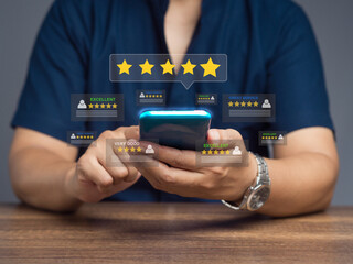satisfaction and feedback surveys. customer using a smartphone gives the five-star icon a rating of 