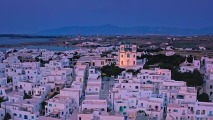 Wall Mural - Greek houses and church of Paros island in Cyclades of Mediterranean sea. Greece