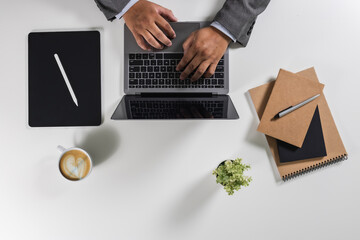 Poster - person designer computer laptop datum document research chart finance marketing Working on a white desk in an office workplace view overhead modern space flat lay