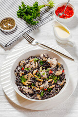 Canvas Print - black rice with cream, chicken, mushrooms, almonds