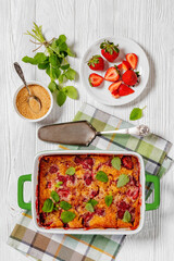 Wall Mural - strawberry cobbler, summer dessert in baking dish