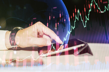 Poster - Multi exposure of abstract creative financial graph with world map and finger presses on a digital tablet on background, forex and investment concept
