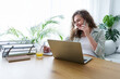 © Westend61 - Smiling pregnant businesswoman talking on smart phone at home office