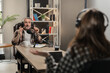 © CinemaF - The employees of the radio station conduct a joint entertainment broadcast. Two bloggers have a joint podcast where they discuss the latest news.