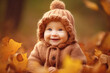 © Robert Kneschke - Cute smiling happy baby in autumn leaves (Generative AI)
