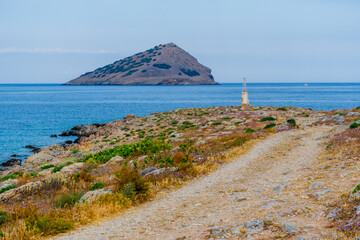 Rocky coast offshore with blue sea, Greece