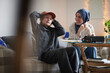 © Johnér - Mother wearing hijab helping tired son with ADD or ADHD doing homework