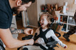 © Johnér - Father taking care of happy disabled child in wheelchair