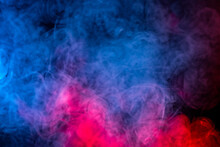 Abstract Texture Smoke In Red Blue On A Black Background.